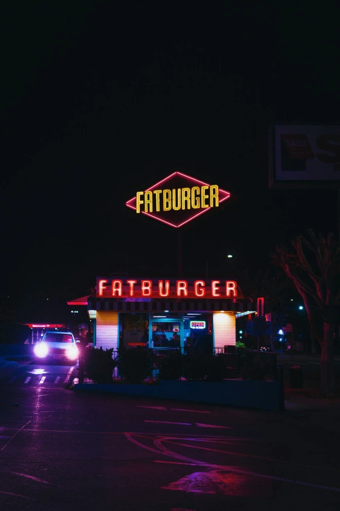 car parked near Fatburger restaurant